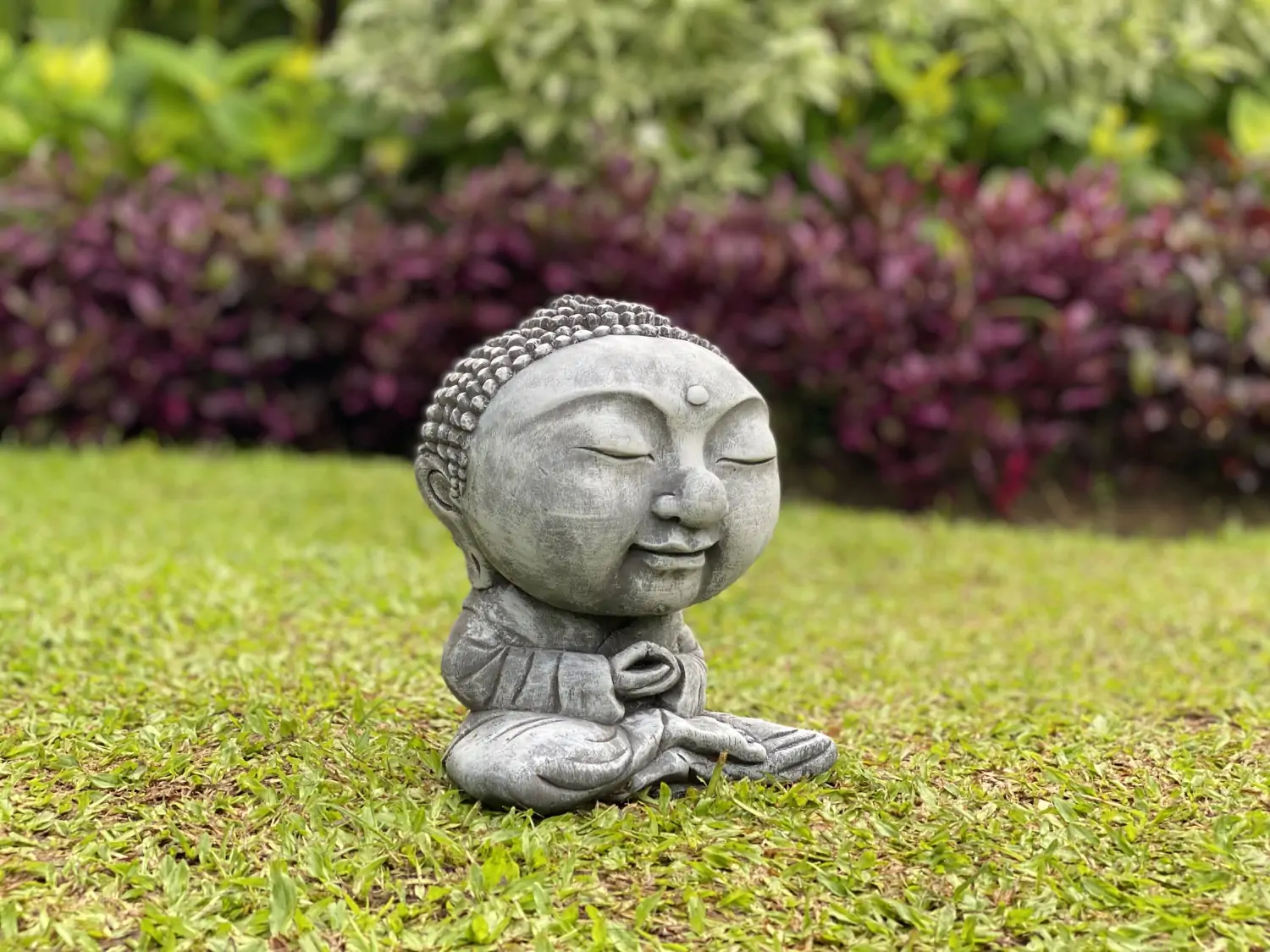  Product image 2 of the product “Nima - Sitting monk with big head, 30 cm H | cast stone ”